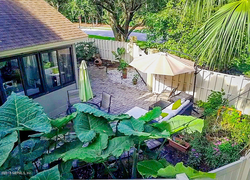 1 Turtleback Trail Ponte Vedra Beach, FL 32082 - Photo 23 of 23 a backyard of a house with lots of green space