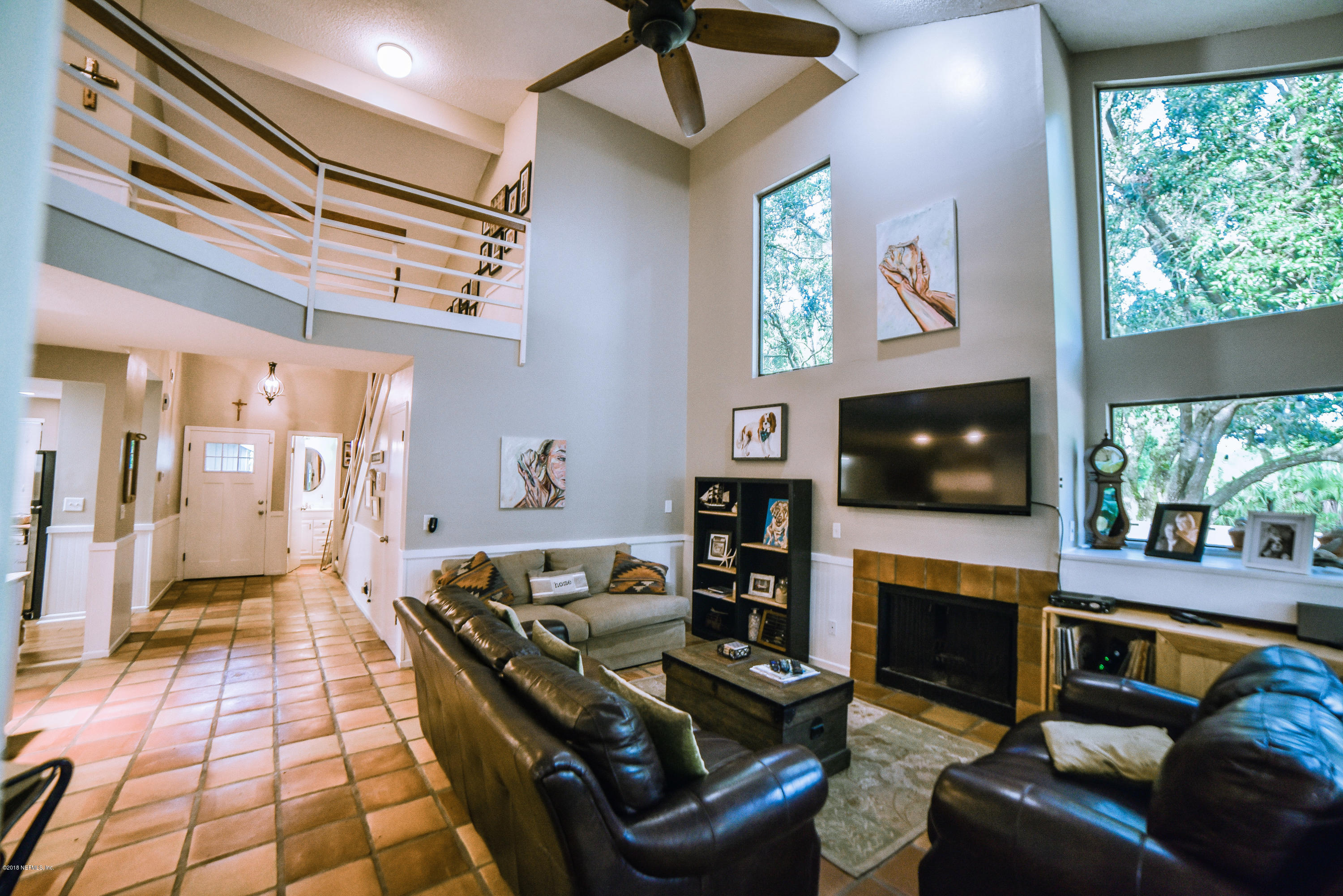 1 Turtleback Trail Ponte Vedra Beach, FL 32082 - Photo 8 of 23 a living room with fireplace furniture and a flat screen tv