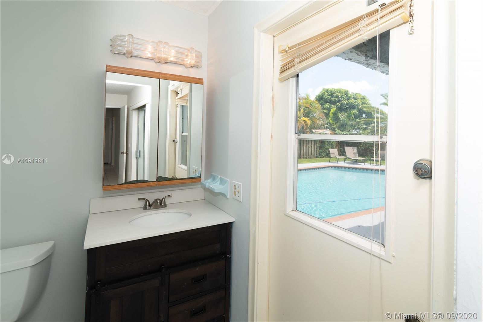 11203 Ladino Street Boca Raton, FL 33428 - Photo 18 of 36 Master Bathroom in 11203 Ladino St. Boca raton FL. Door to the right is overlooking the Deck and Pool area.