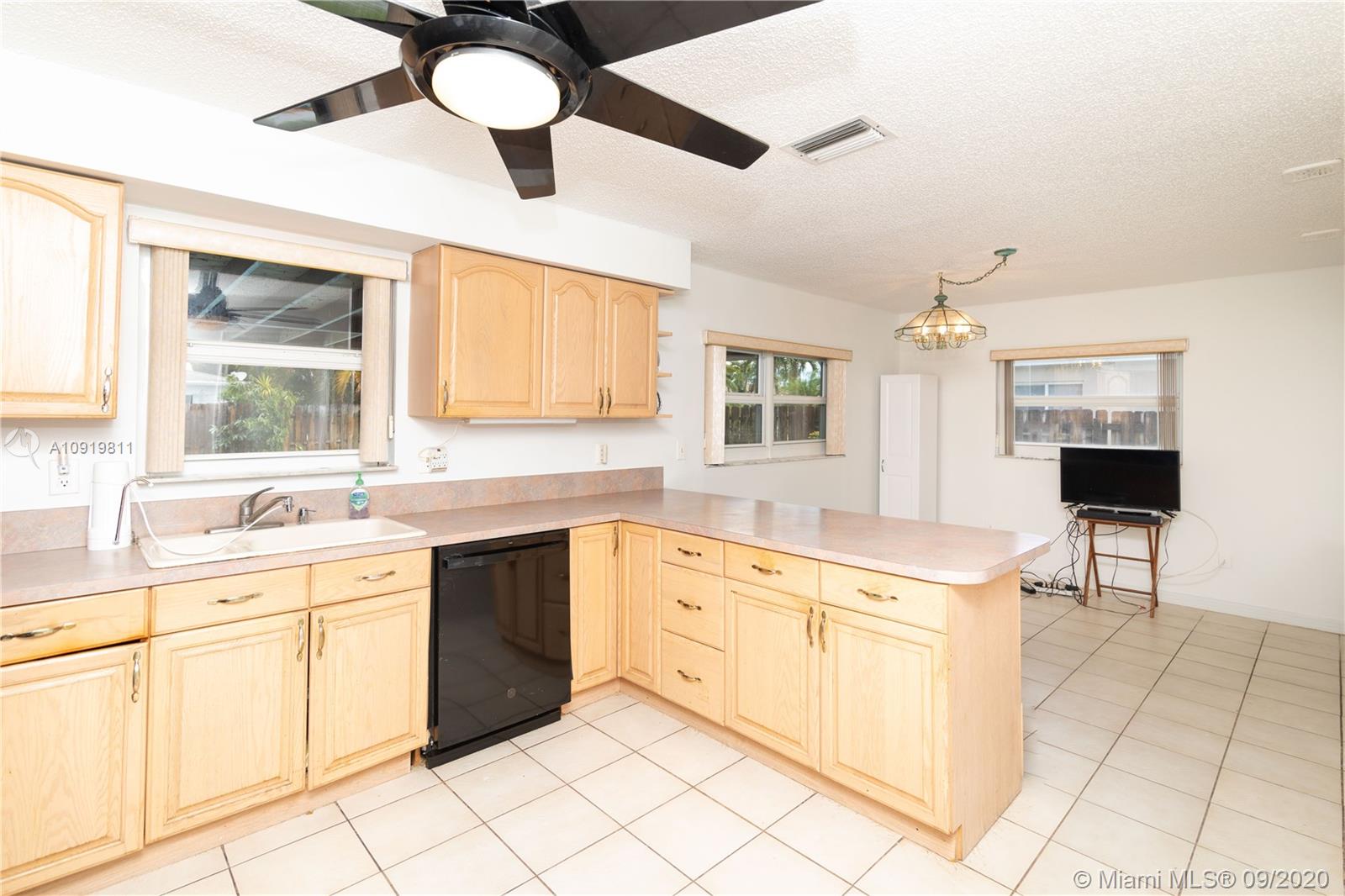 11203 Ladino Street Boca Raton, FL 33428 - Photo 4 of 36 Kitchen and Dinning area in 11203 Ladino St. Boca Raton FL 33428 - 3953