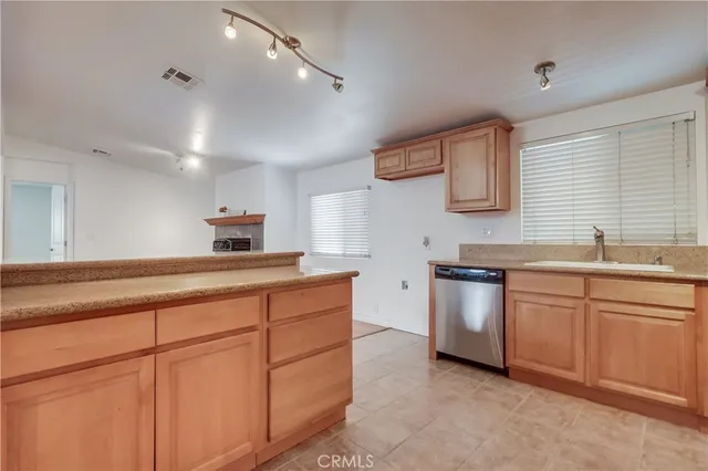 a view of a livingroom with wooden floor