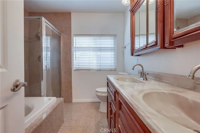 a bathroom with a sink and toilet