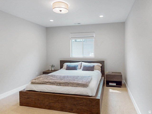 355 East Overlook Loop Hideout, UT 84036 - Photo 32 of 40 Bedroom #3 features recessed lighting and a central ceiling fixture and light-colored carpet, a window with blinds, and white baseboards
