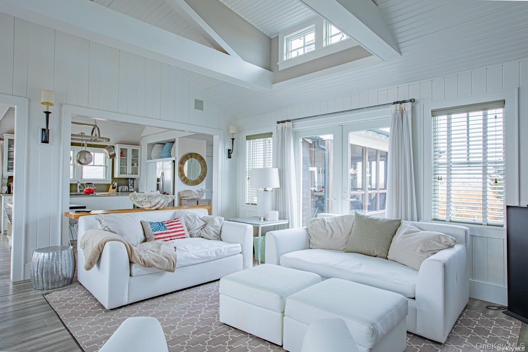 11 Captree Island Babylon, NY 11702 - Photo 14 of 31 a living room with furniture and a large window