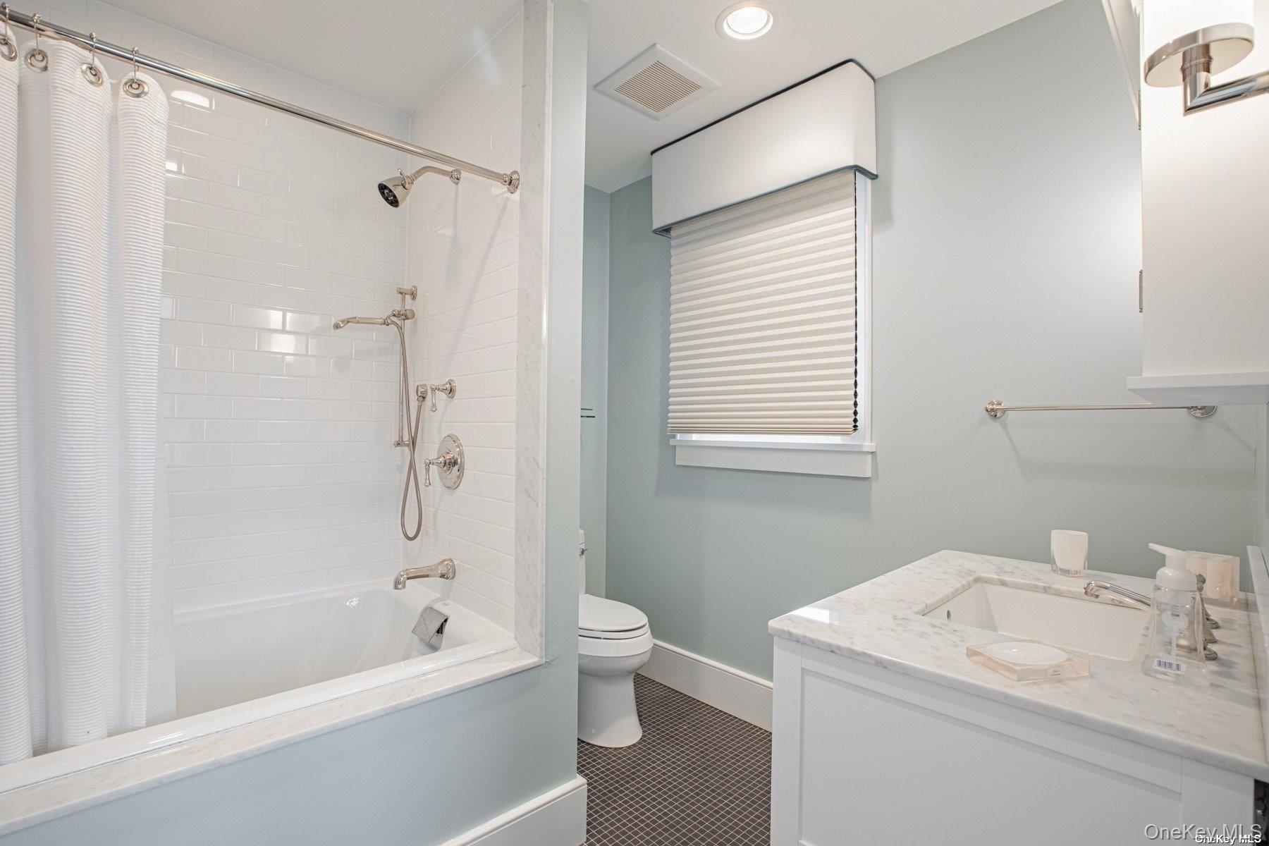 11 Captree Island Babylon, NY 11702 - Photo 17 of 31 a bathroom with a sink a toilet and shower