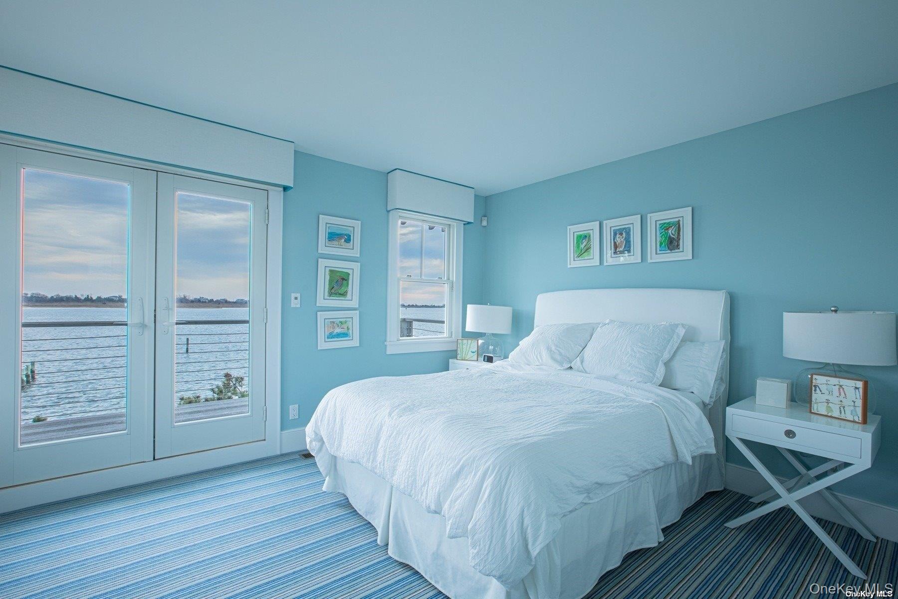 11 Captree Island Babylon, NY 11702 - Photo 20 of 31 a bedroom with a bed and a wooden floor