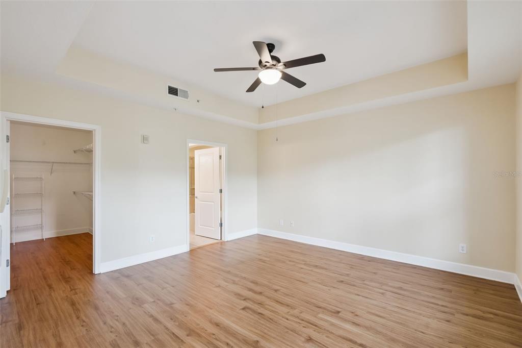 1400 Celebration Avenue, Unit 305 Celebration, FL 34747 - Photo 21 of 38 a view of empty room with wooden floor