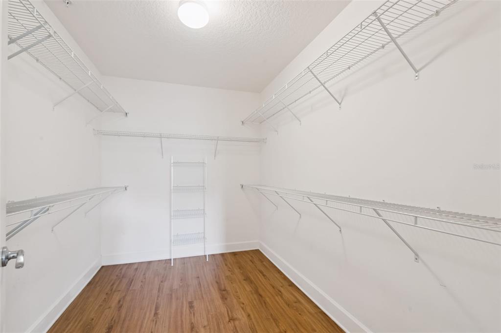 1400 Celebration Avenue, Unit 305 Celebration, FL 34747 - Photo 27 of 38 a view of a room with wooden floor