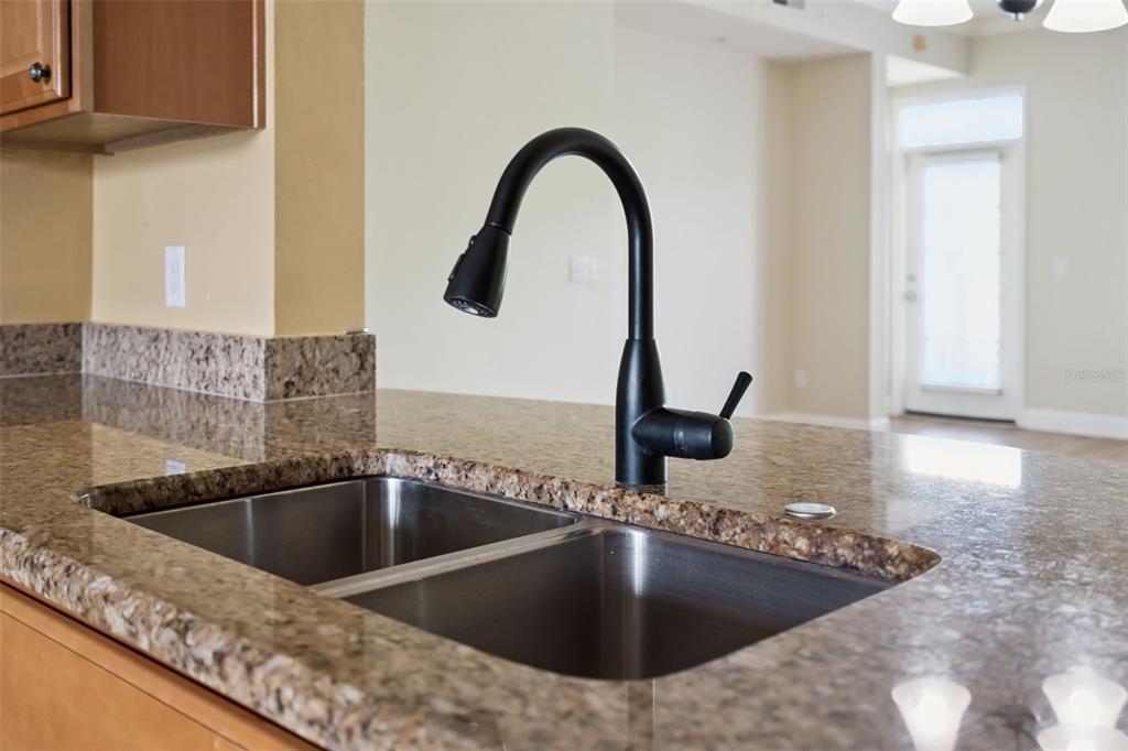 1400 Celebration Avenue, Unit 305 Celebration, FL 34747 - Photo 7 of 38 a close view of sink and tap