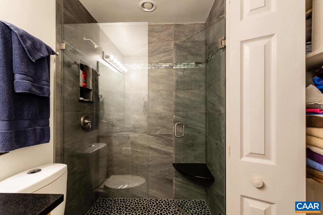 6 Stigger Road Palmyra, VA 22963 - Photo 3 of 37 a bathroom with a toilet and a shower