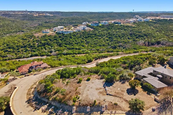 an aerial view of a house with a garden