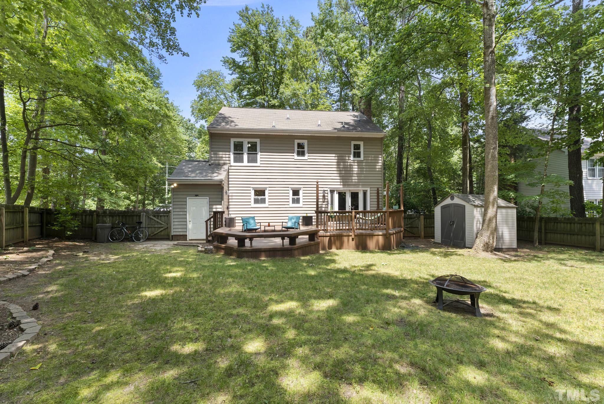 4205 Pleasant Grove Church Road Raleigh, NC 27613 - Photo 27 of 34 a view of a house with swimming pool and sitting area