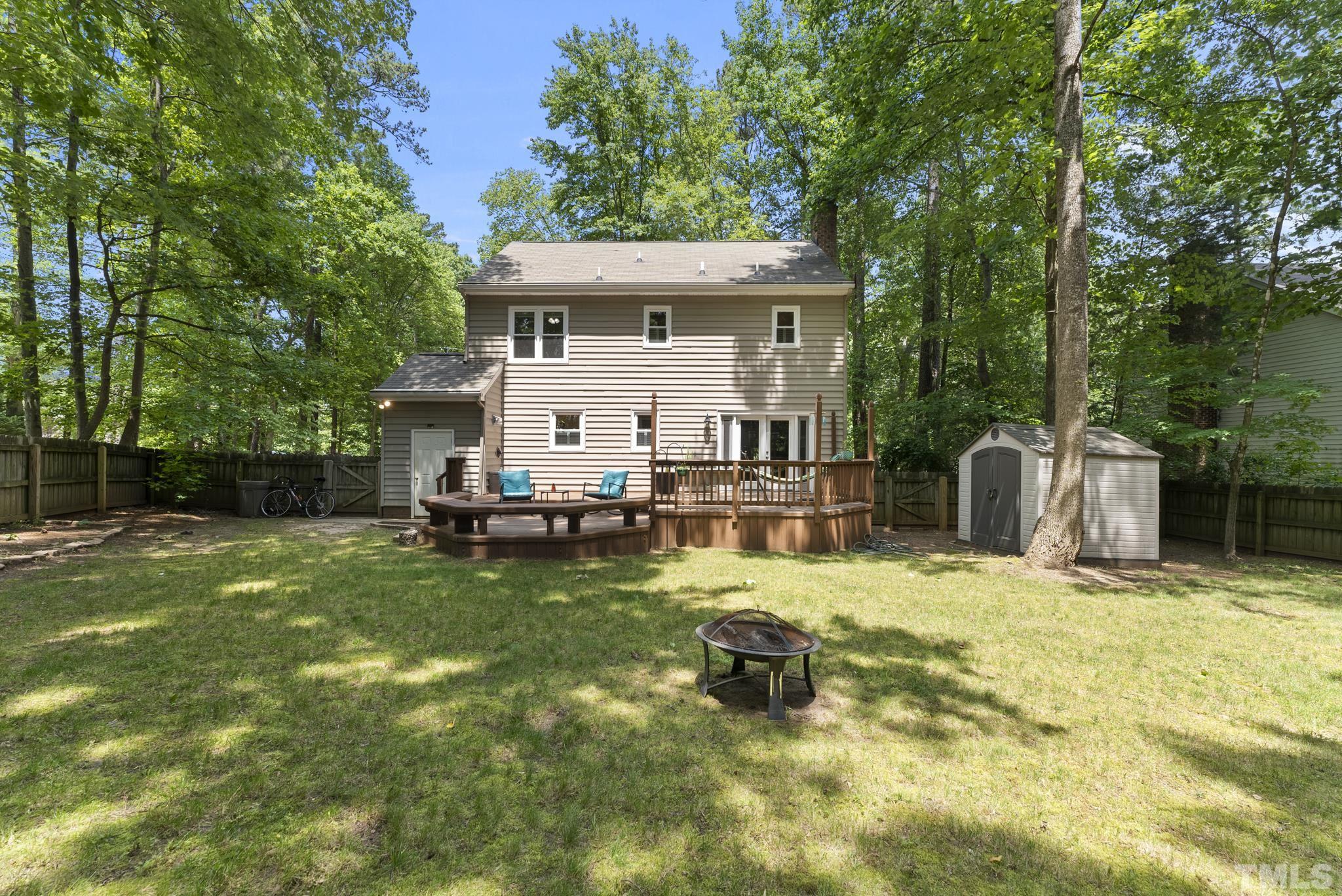 4205 Pleasant Grove Church Road Raleigh, NC 27613 - Photo 28 of 34 a view of a house with backyard and sitting area