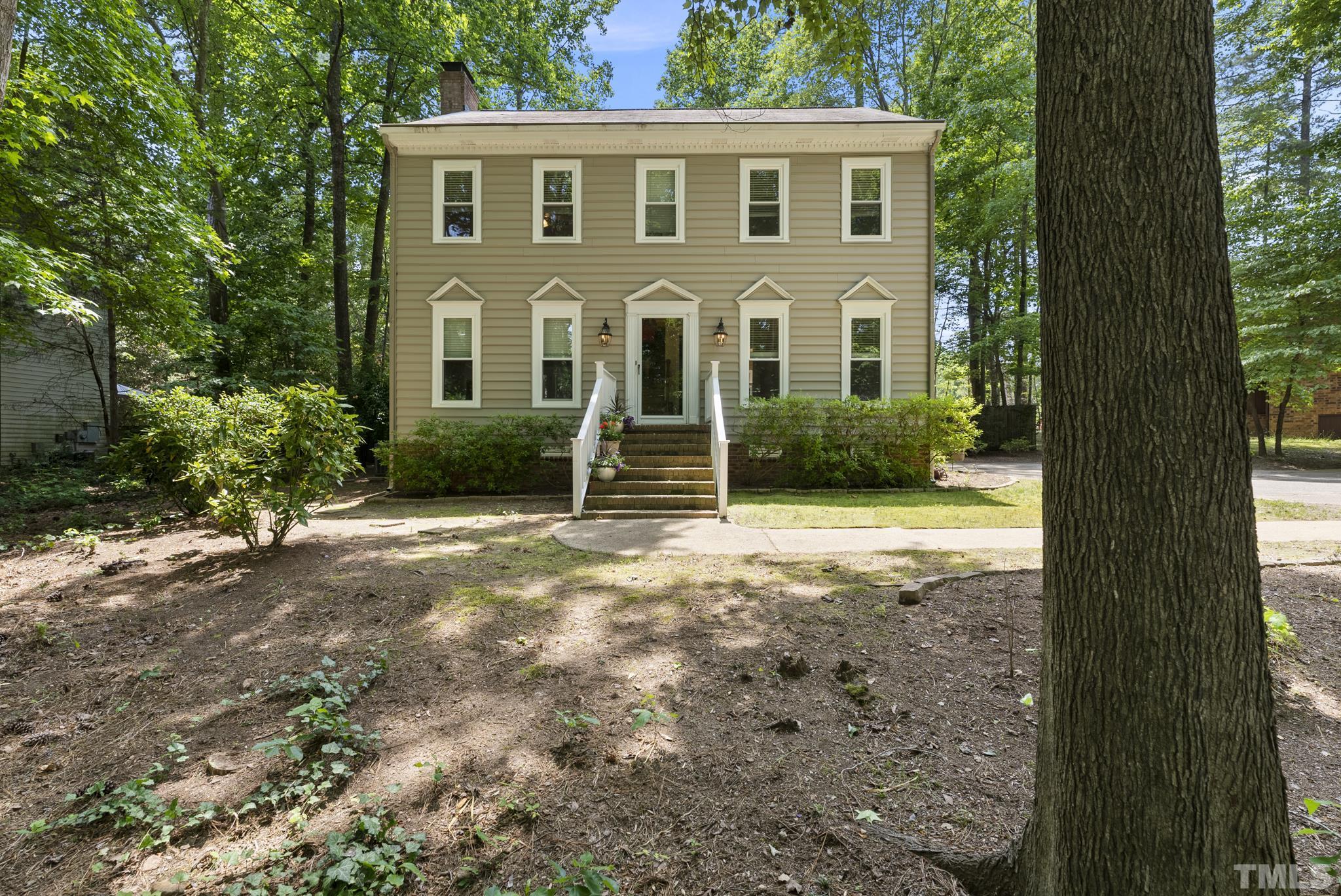 4205 Pleasant Grove Church Road Raleigh, NC 27613 - Photo 33 of 34 a front view of a house with a yard