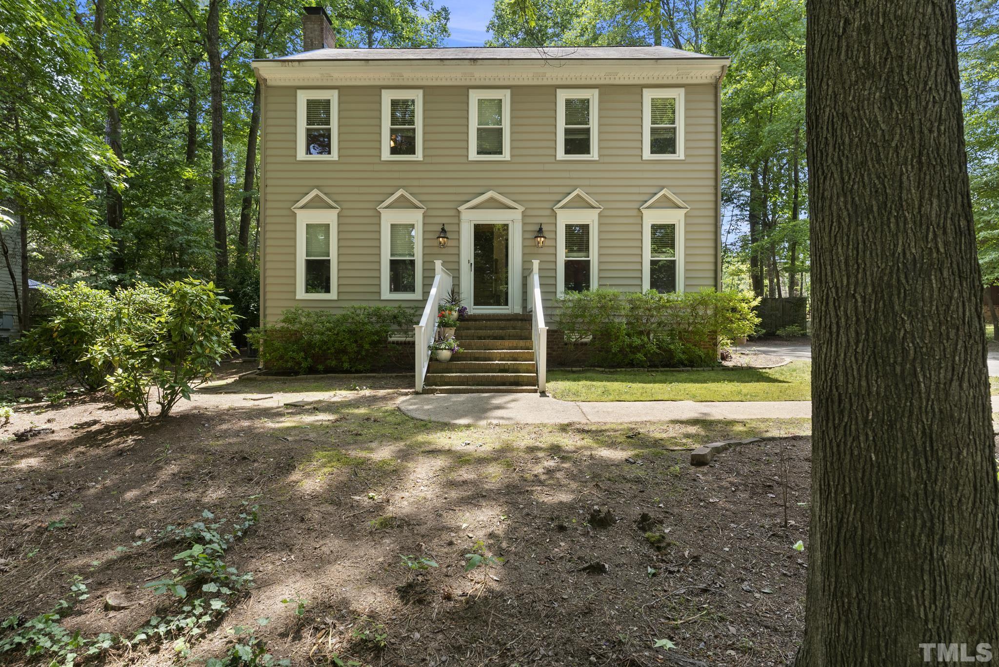 4205 Pleasant Grove Church Road Raleigh, NC 27613 - Photo 34 of 34 front view of a house with a yard
