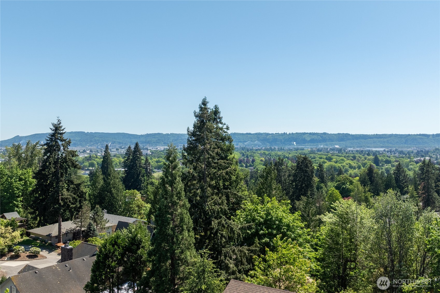 10 Jeffery Place Longview, WA 98632 - Photo 2 of 40 a view of a city with lush green forest