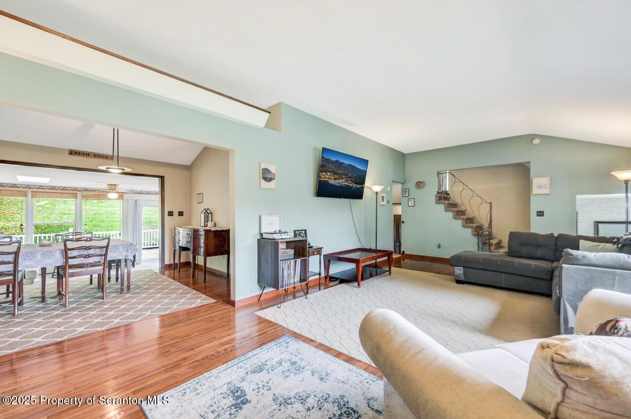 2352 Newton Ransom Boulevard Clarks Summit, PA 18411 - Photo 11 of 85 a living room with furniture and a wooden floor