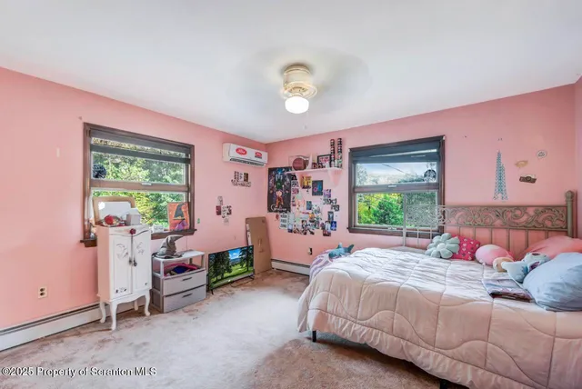 a room with furniture and a window