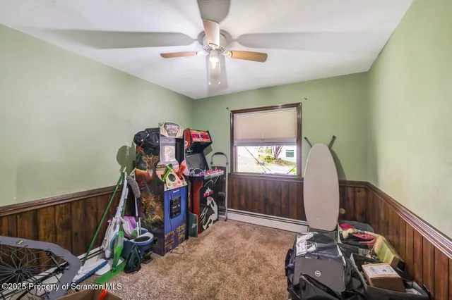 a house that has a tree in front of it