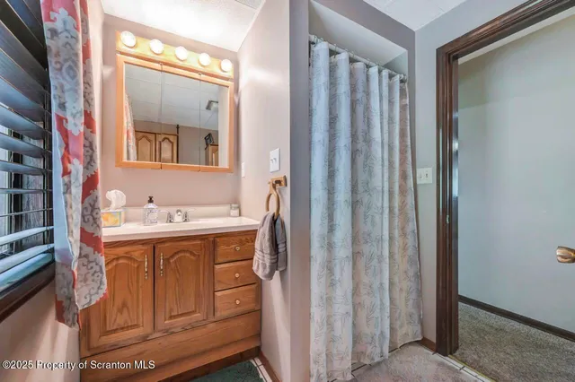 a view of a house with a big yard