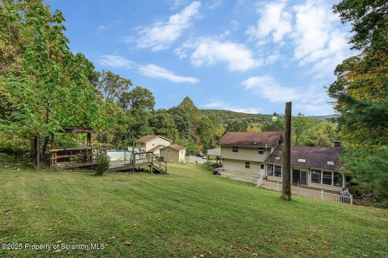 2352 Newton Ransom Boulevard Clarks Summit, PA 18411 - Photo 5 of 85 a view of yard with seating area