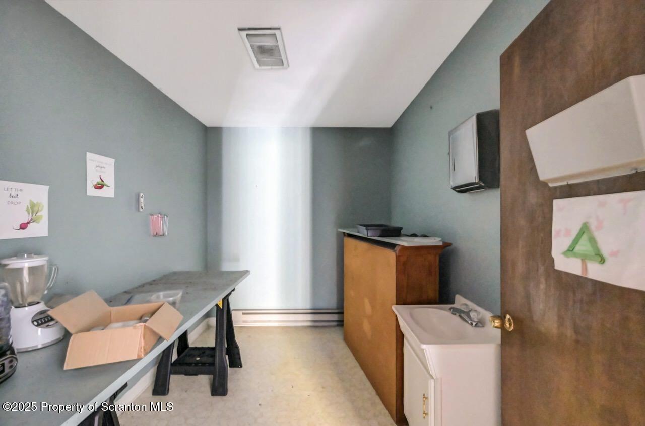 2352 Newton Ransom Boulevard Clarks Summit, PA 18411 - Photo 54 of 85 a room with furniture and a window