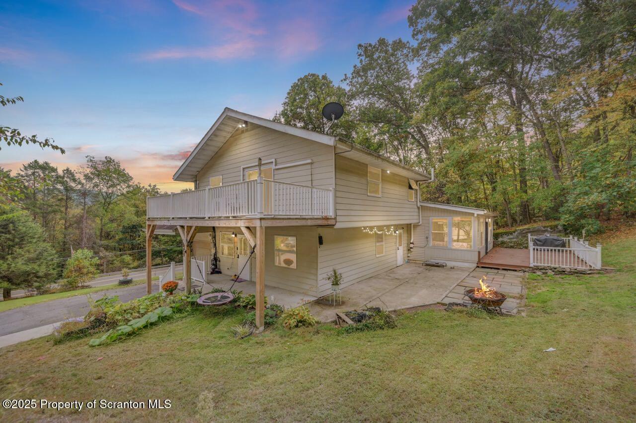 2352 Newton Ransom Boulevard Clarks Summit, PA 18411 - Photo 6 of 85 front view of a house with a yard