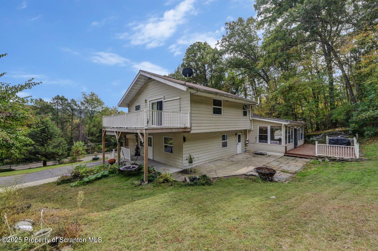 2352 Newton Ransom Boulevard Clarks Summit, PA 18411 - Photo 62 of 85 a front view of house with yard and green space