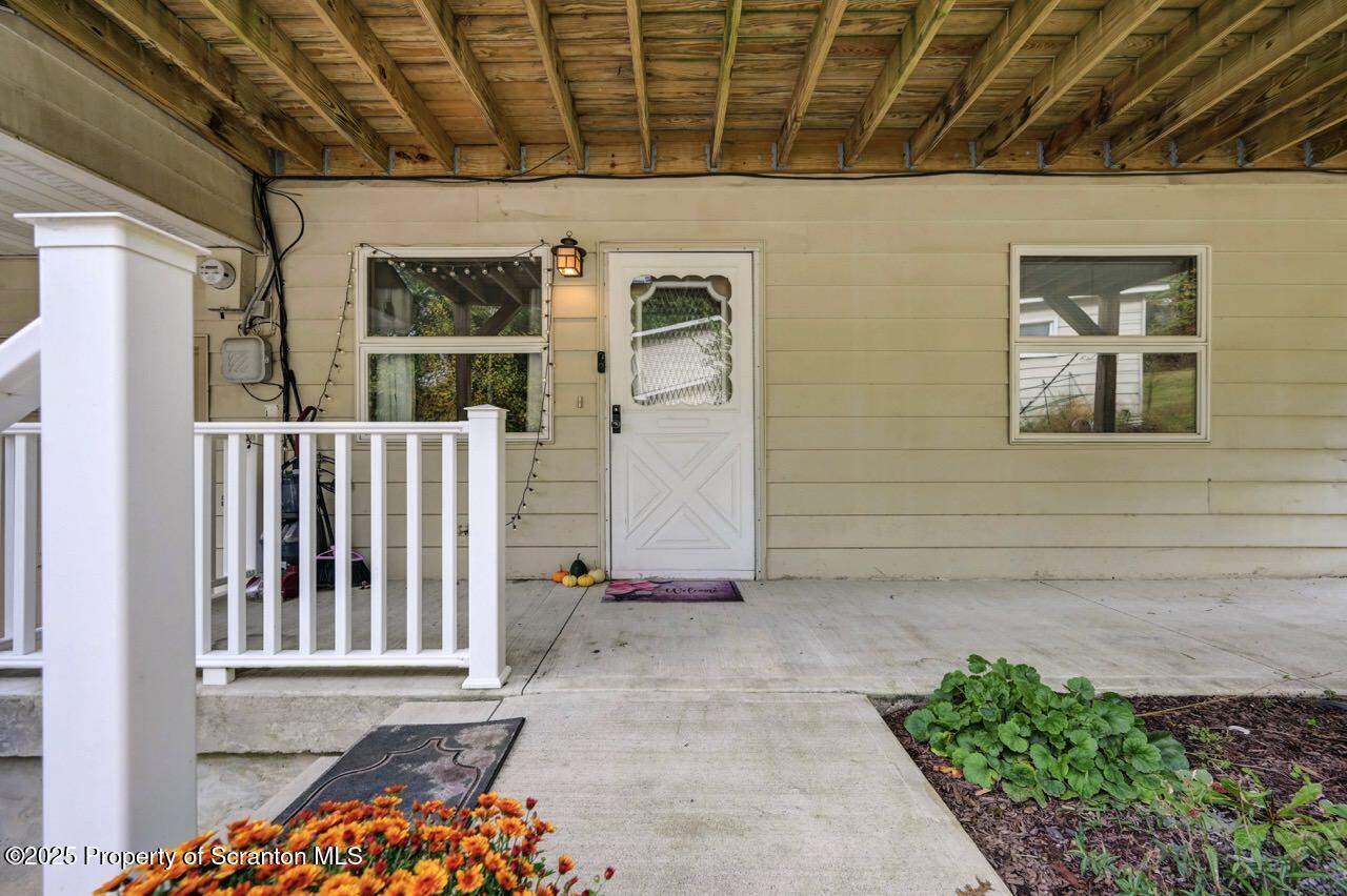 2352 Newton Ransom Boulevard Clarks Summit, PA 18411 - Photo 69 of 85 a view of a porch with a door