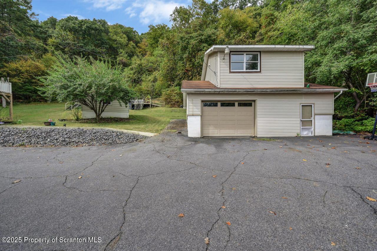 2352 Newton Ransom Boulevard Clarks Summit, PA 18411 - Photo 70 of 85 a house that has a tree in front of it