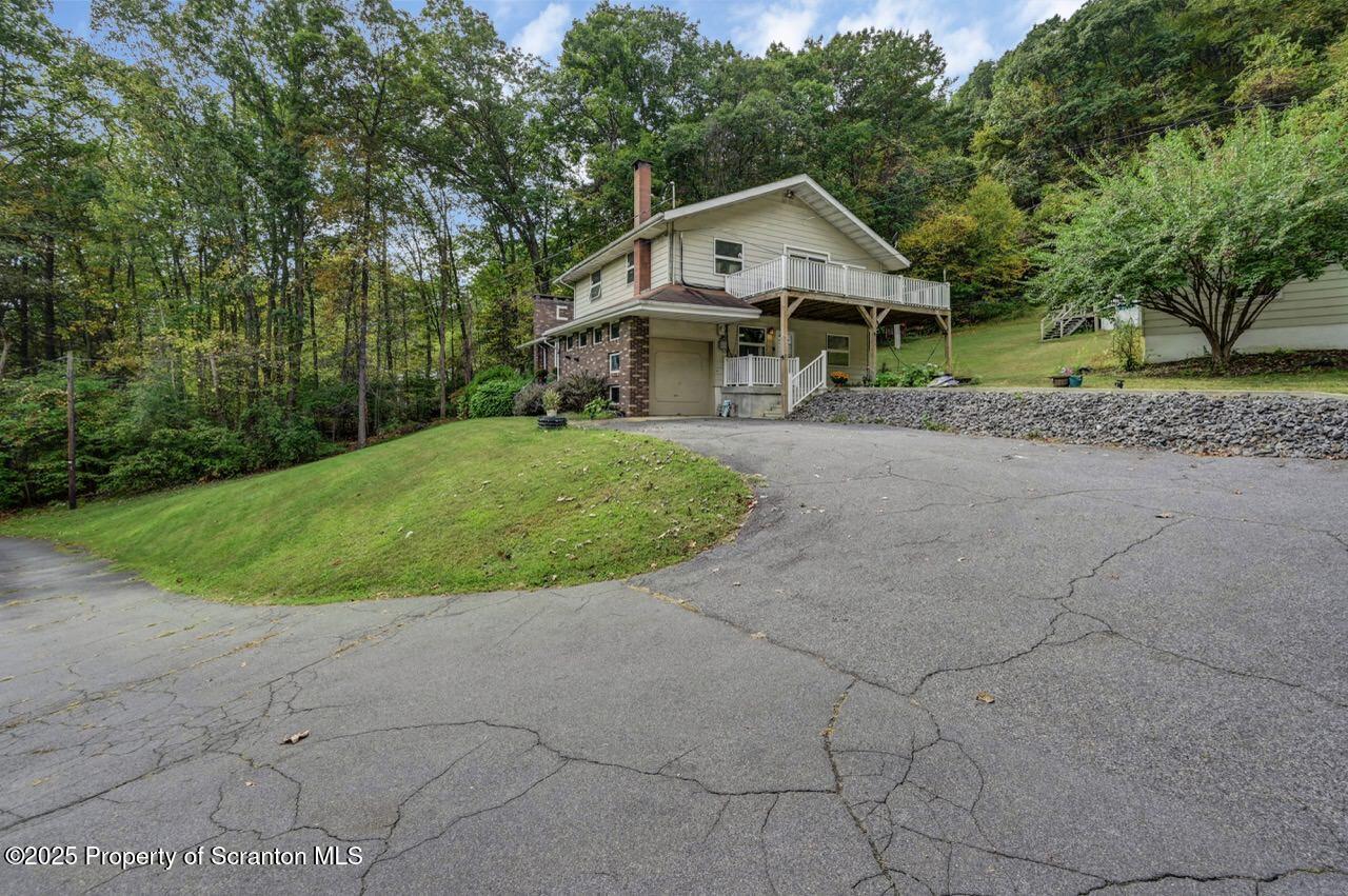 2352 Newton Ransom Boulevard Clarks Summit, PA 18411 - Photo 71 of 85 a front view of a house with a yard