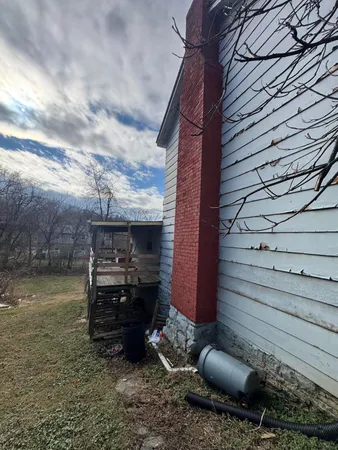 a view of a backyard of a house