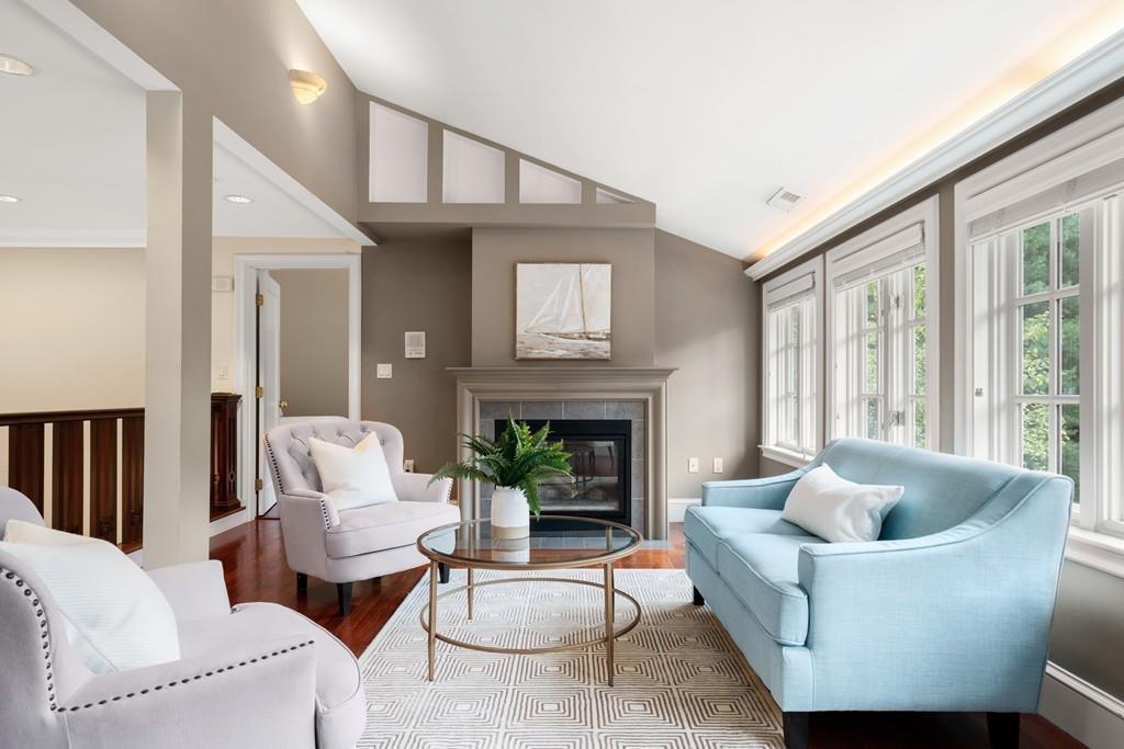 11 Clovelly Road Newton, MA 02467 - Photo 22 of 25 a living room with furniture and a fireplace