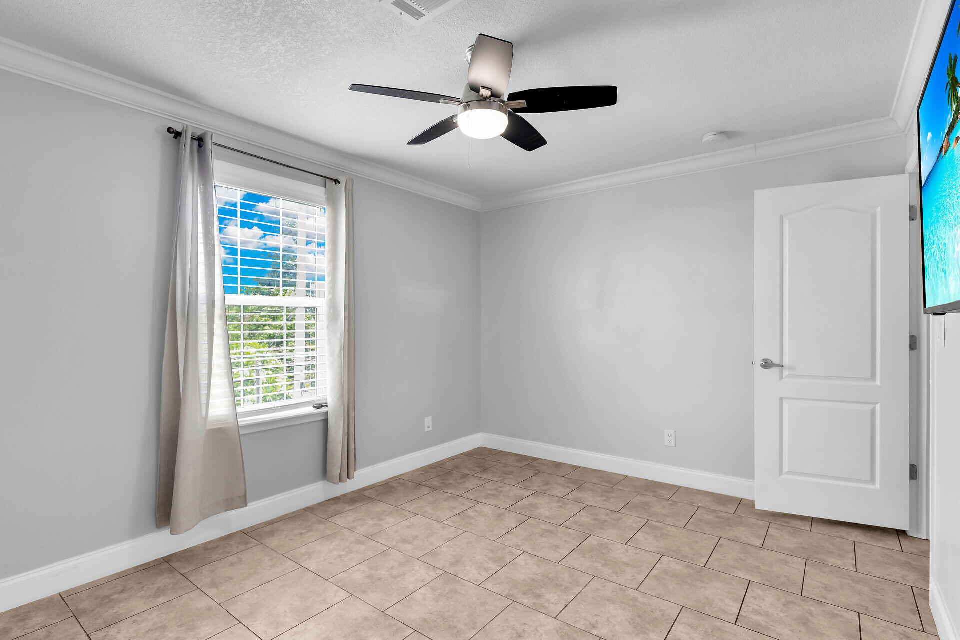 59 Ed Swift Road Key West, FL 33040 - Photo 23 of 35 a view of an empty room with a window