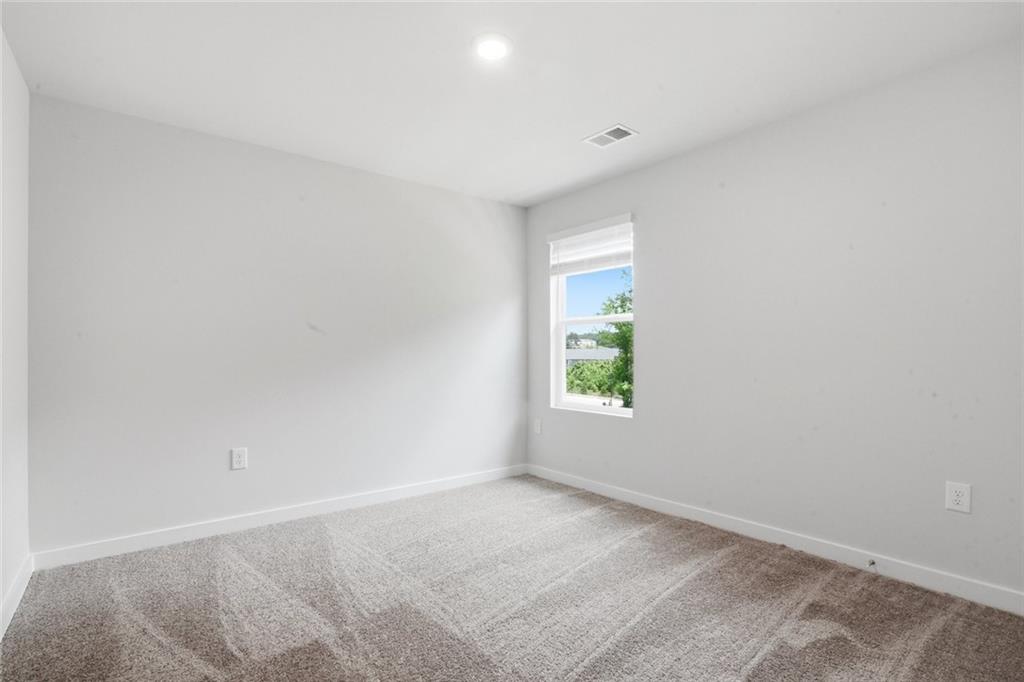 5351 Tolar Road South Fulton, GA 30213 - Photo 22 of 30 a view of an empty room with a window