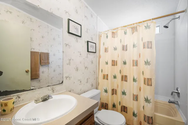 a view of deck with chairs and wooden floor