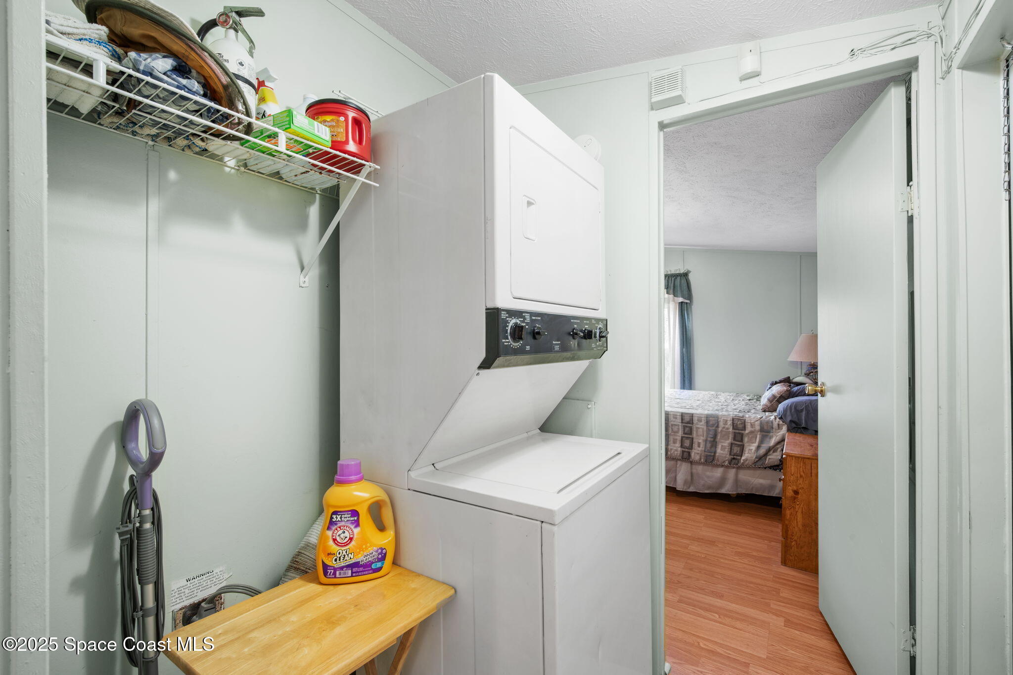 6672 Bear Trail Cocoa, FL 32926 - Photo 25 of 46 a utility room with dryer and washer