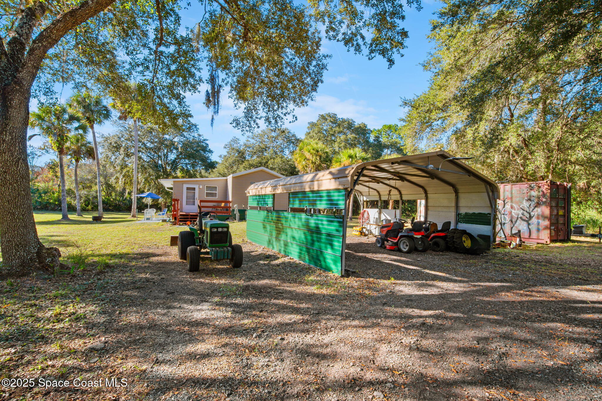 6672 Bear Trail Cocoa, FL 32926 - Photo 34 of 46 a view of a car is parked in front of a house