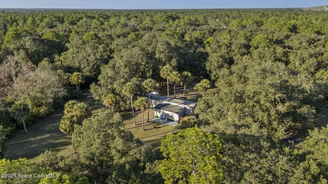 a view of a field with an outdoor space