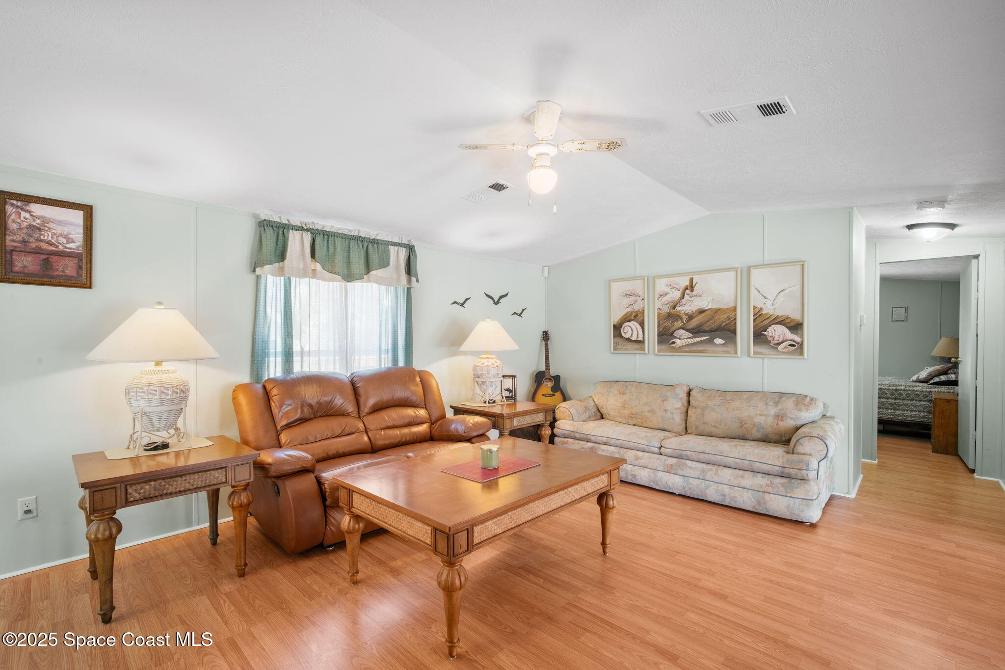 6672 Bear Trail Cocoa, FL 32926 - Photo 9 of 46 a living room with furniture