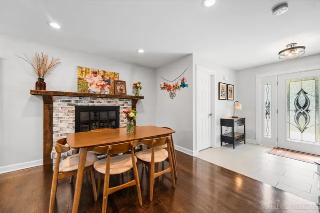 a view of a livingroom with furniture and a fireplace