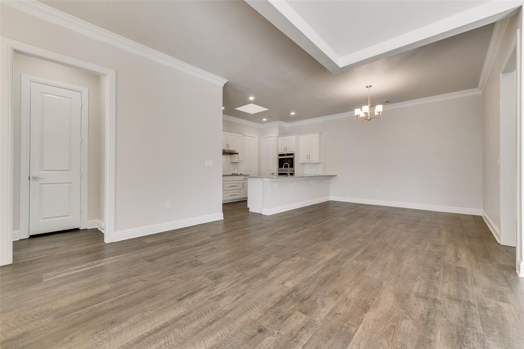 8841 Creek Run Road, Unit 403 Fort Worth, TX 76120 - Photo 8 of 26 a view of kitchen with wooden floor