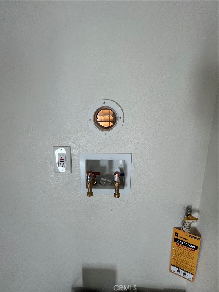 3438 Locust Street Riverside, CA 92501 - Photo 13 of 38 a view of bathroom with a shower curtain