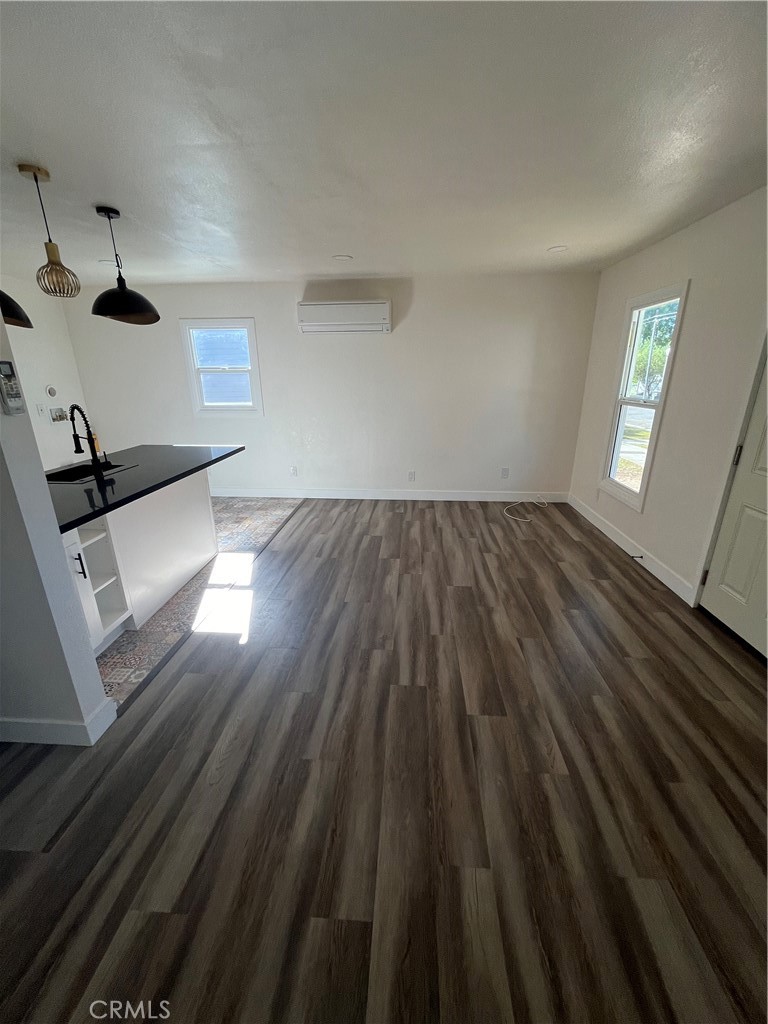 3438 Locust Street Riverside, CA 92501 - Photo 17 of 38 a view of an empty room and wooden floor