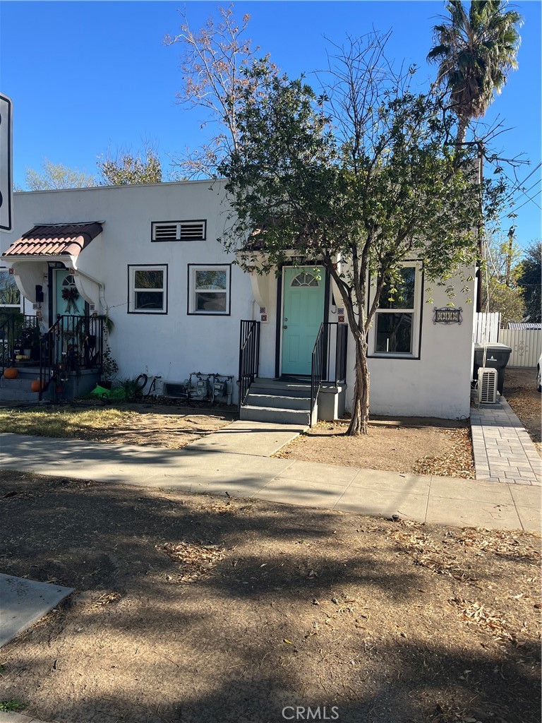 3438 Locust Street Riverside, CA 92501 - Photo 5 of 38 a view of a house with snow on the road