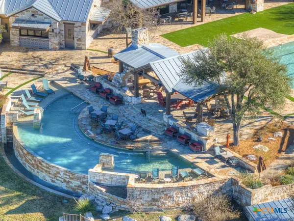 a view of a water fountain in the backyard