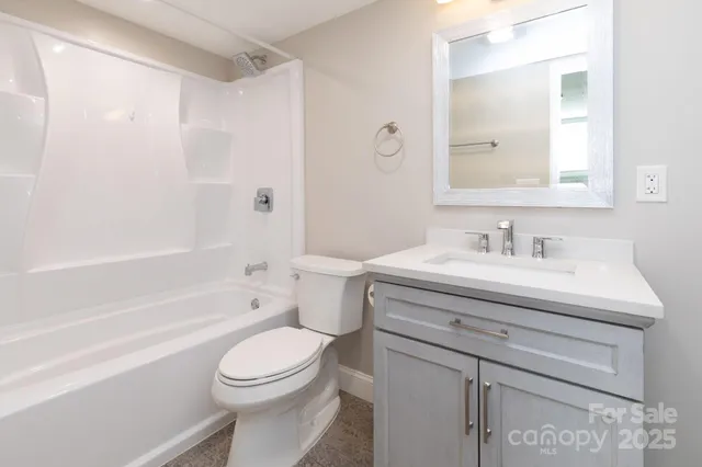 a bathroom with a sink a toilet and a bathtub