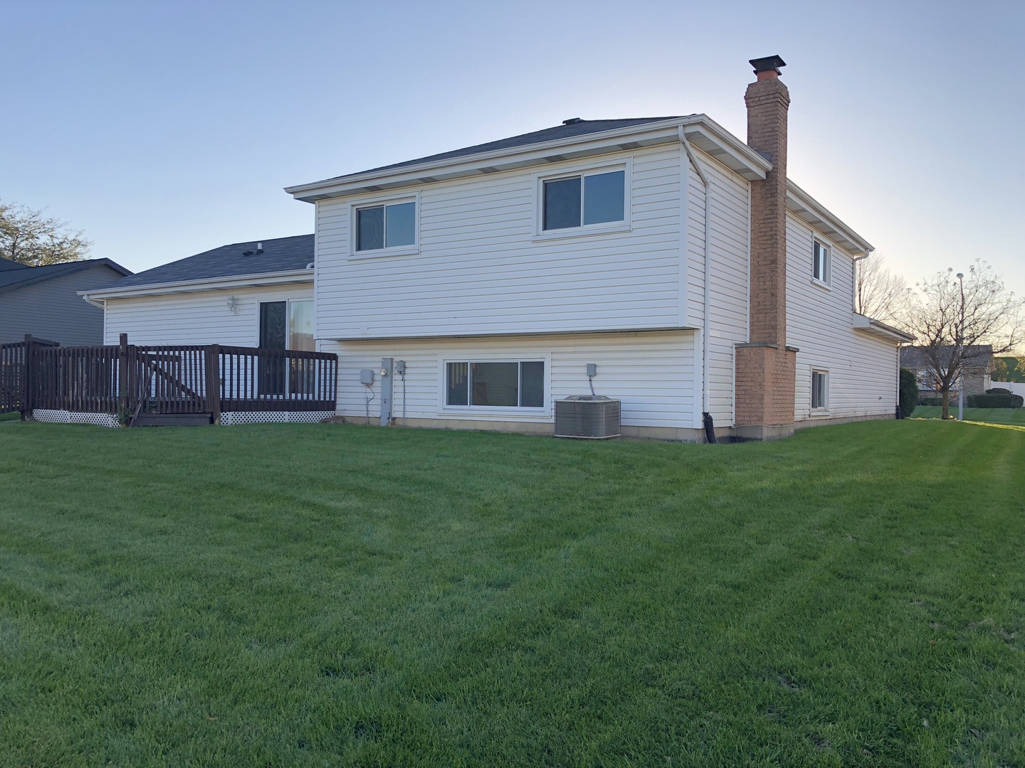 409 Highland Road Matteson, IL 60443 - Photo 20 of 21 a front view of house with yard and green space