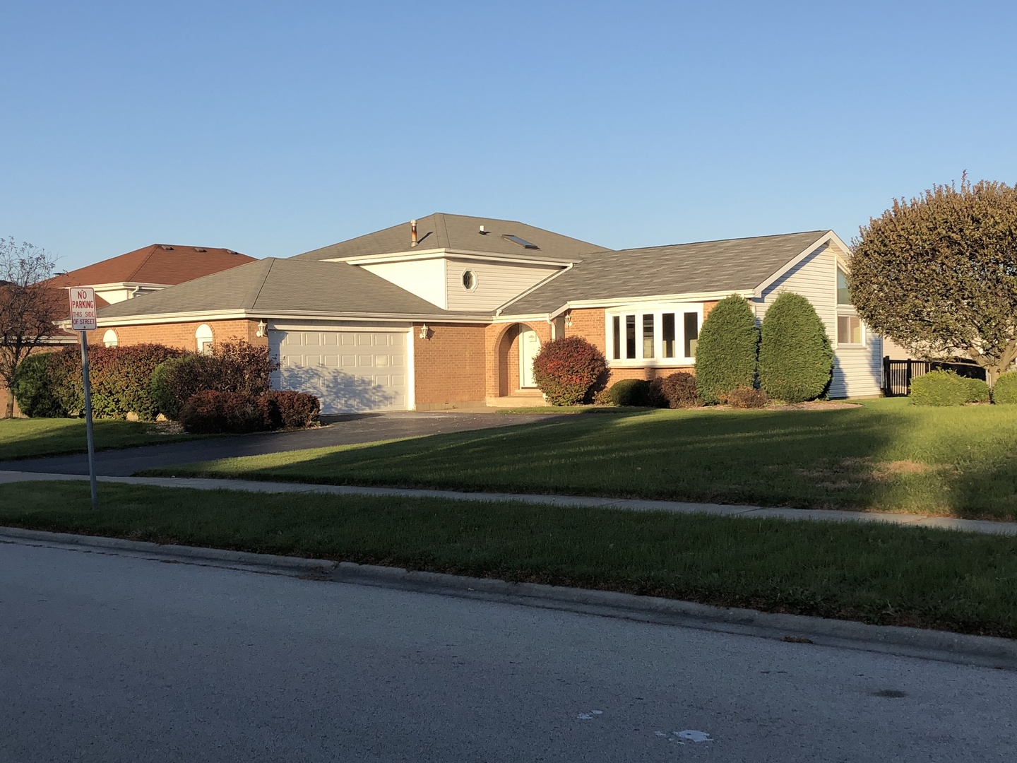 409 Highland Road Matteson, IL 60443 - Photo 3 of 21 a front view of a house with a yard