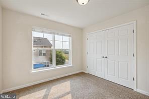 6196 Murray Terrace Frederick, MD 21703 - Photo 9 of 12 a view of an empty room with a window